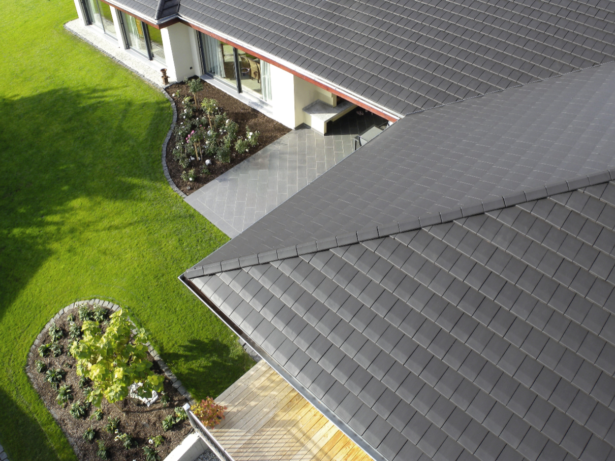 close up flat roof tiles noble graphite, aerial view