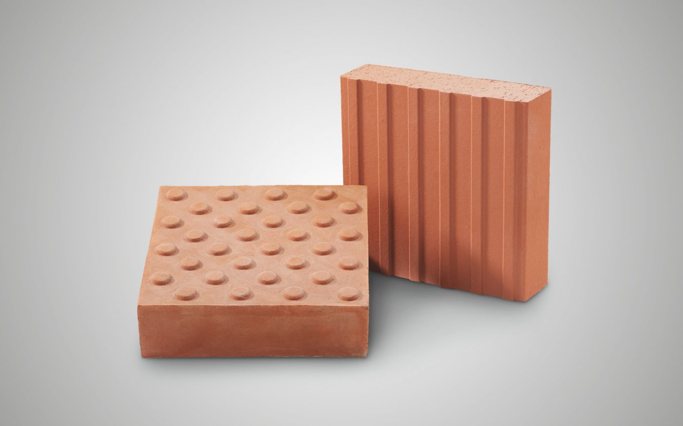 Blindenleitklinker Grauer Hintergrund