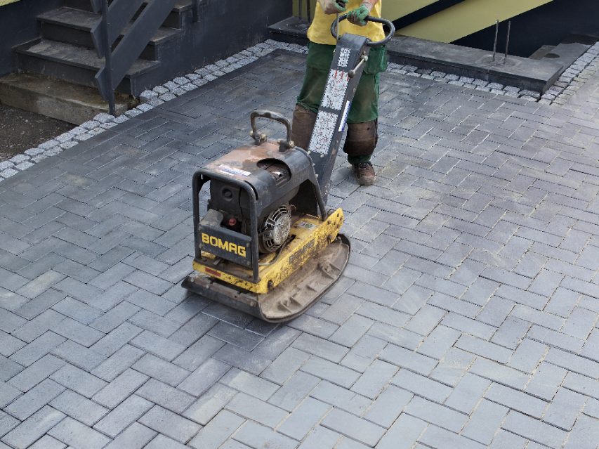 vibrator, construction worker, paver, paving stone, penter, brick, compaction, compression