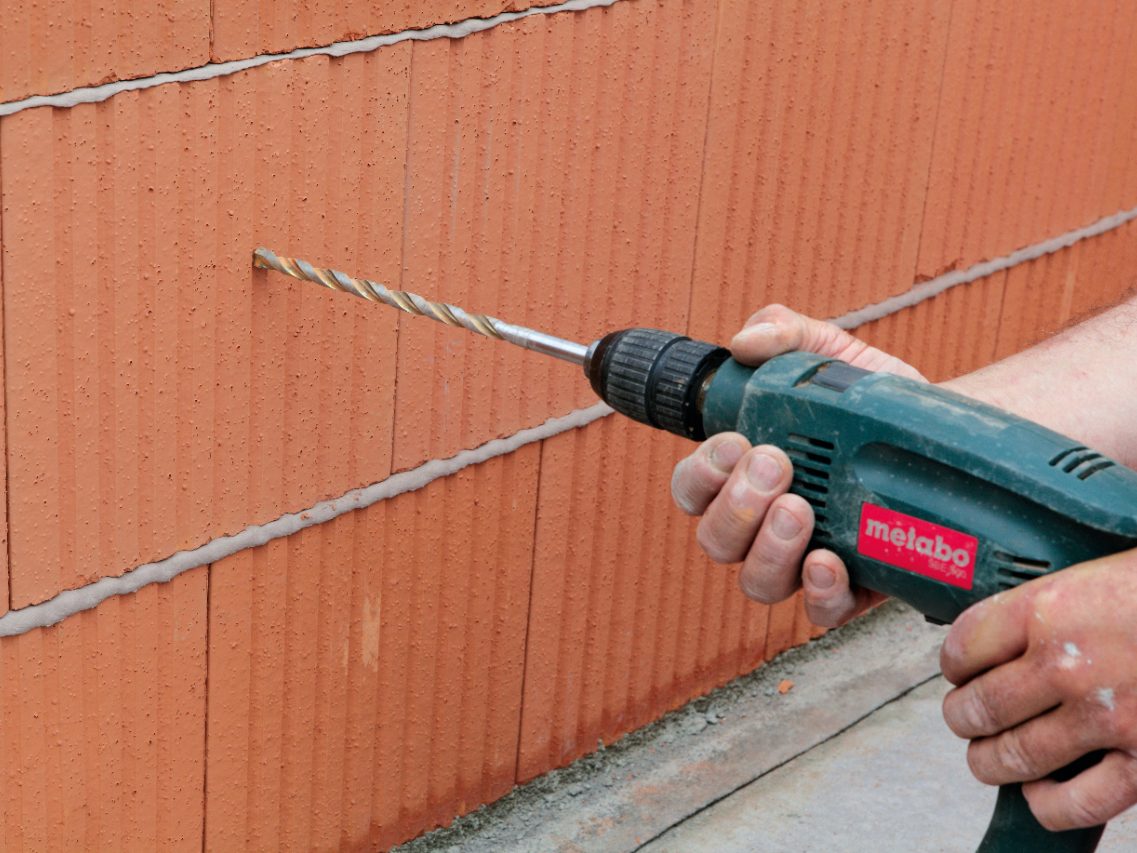 poroton, mortar, construction worker, drilling machine, drill