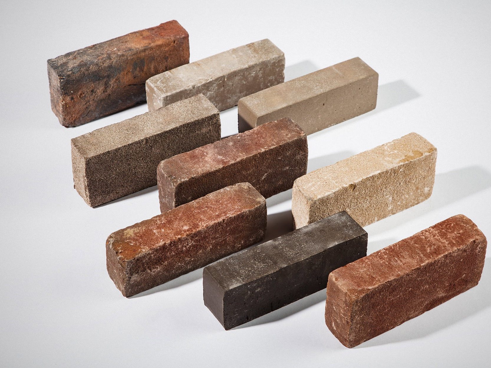 Photo of several wienerberger clay pavers on a white backgroud