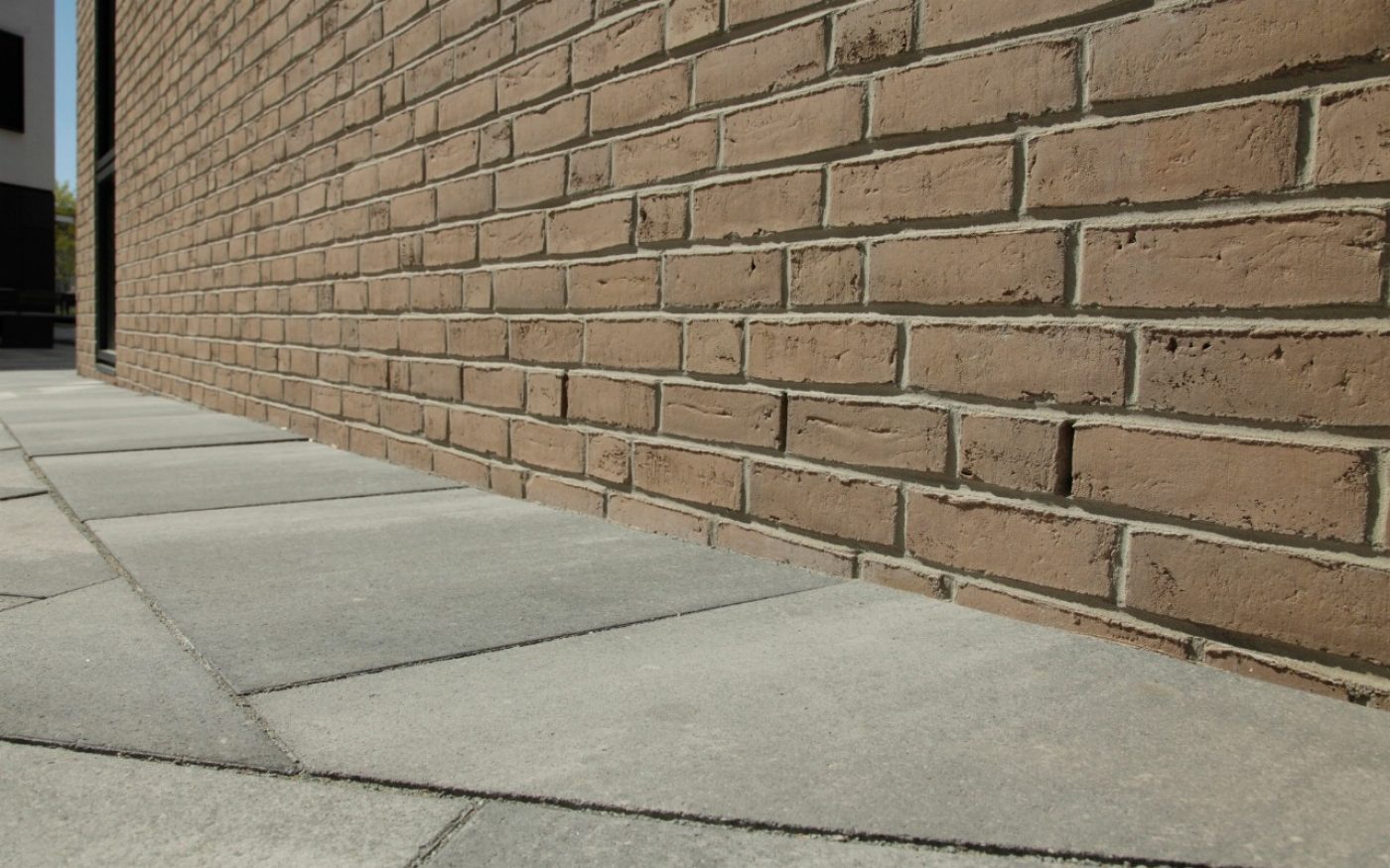 close-up on product; sidewalk; product: Terca HKS grey-brown (custom build)