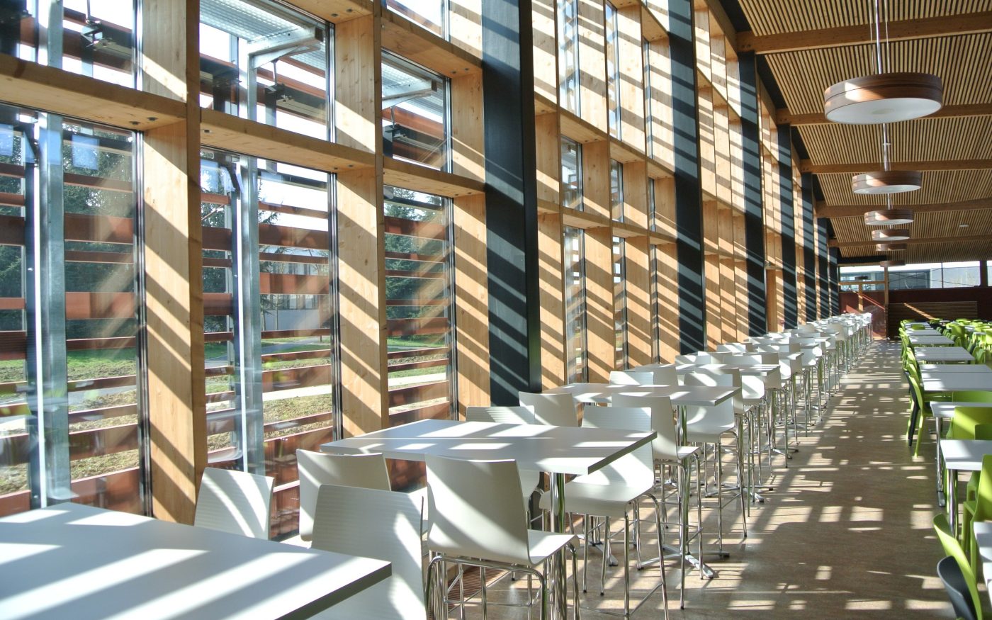 University restaurant including a kitchen, a restoration room, a VIP room and a take away. Building with a green roof and a fired clay facade. National Winner of  wood construction. Metz'In,  6 Rue Augustin Fresnel, 57070 Metz. Panels Argeton Barro Rouge naturel.