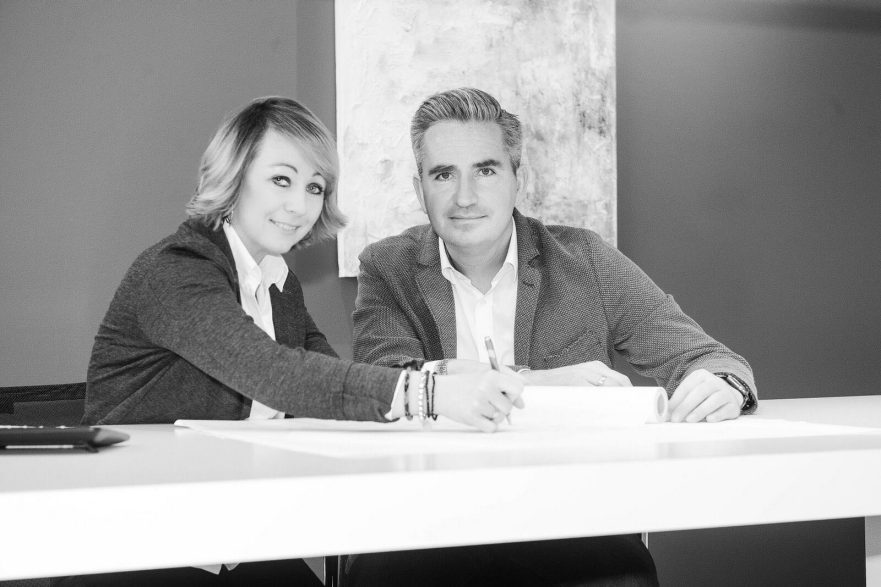 Black and white photograph of architects Anja and Jochen Engelshove