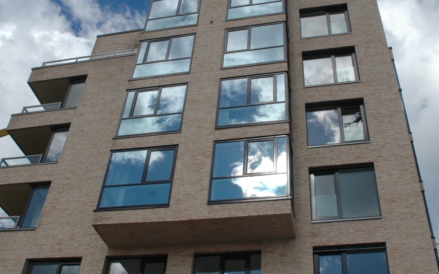 Bird's eye view, Large windows, Protruding houses, Balconies, Clouds, Objektsortierung Tallinn, tabac-beige