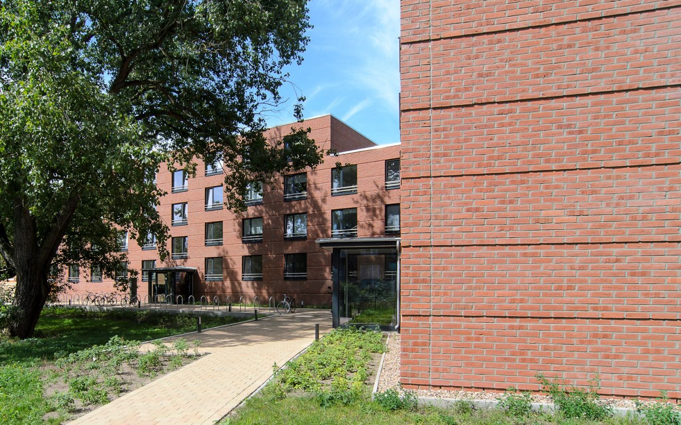 Entrance area of a dormitory, trees, green area, building, Campus 460