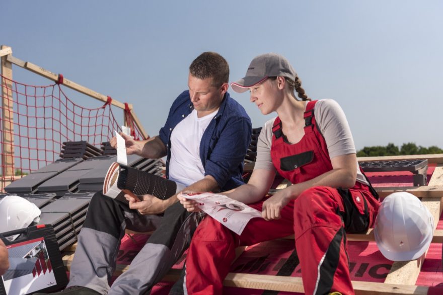 Roofers installing Actua roof tiles