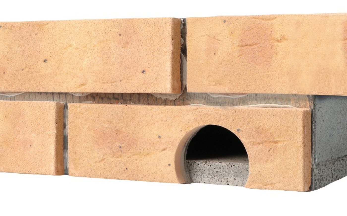 Nistkästen für Mausersegler (2) und Höhlenbrüter (3) bestehen aus Faserbeton, beklebt mit gesägten Halbsteinen oder geschnittenen Riemchen.