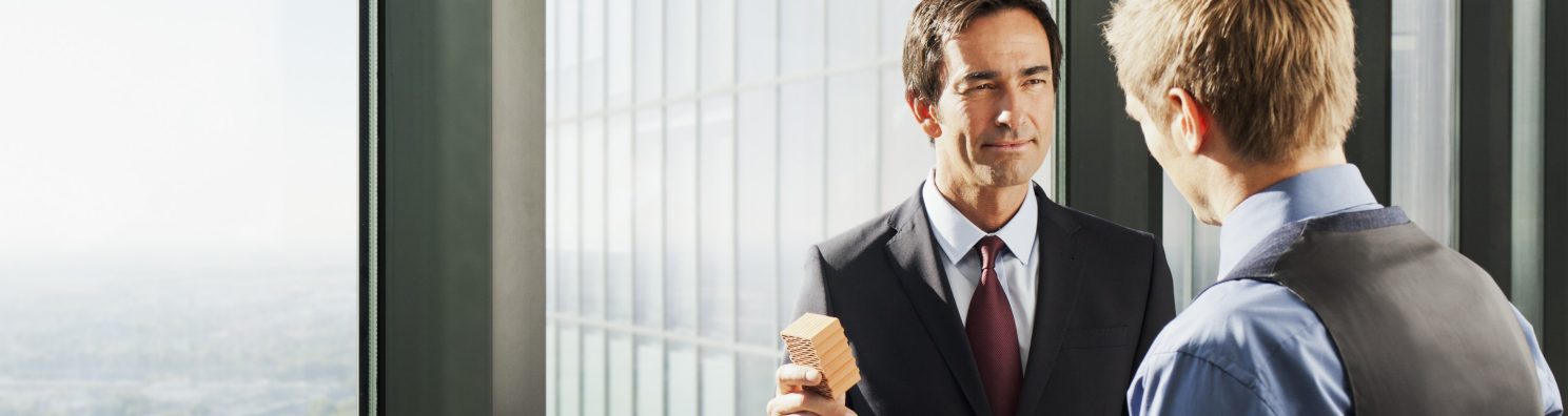 Business people at high-rise building with stunning view